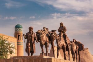 a group of statues on a wall